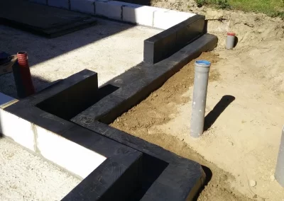 Service imperméabilisation de fondation et pose de drain français à Laval sur la Rive-Nord de Montreal / Excavation Laurentides